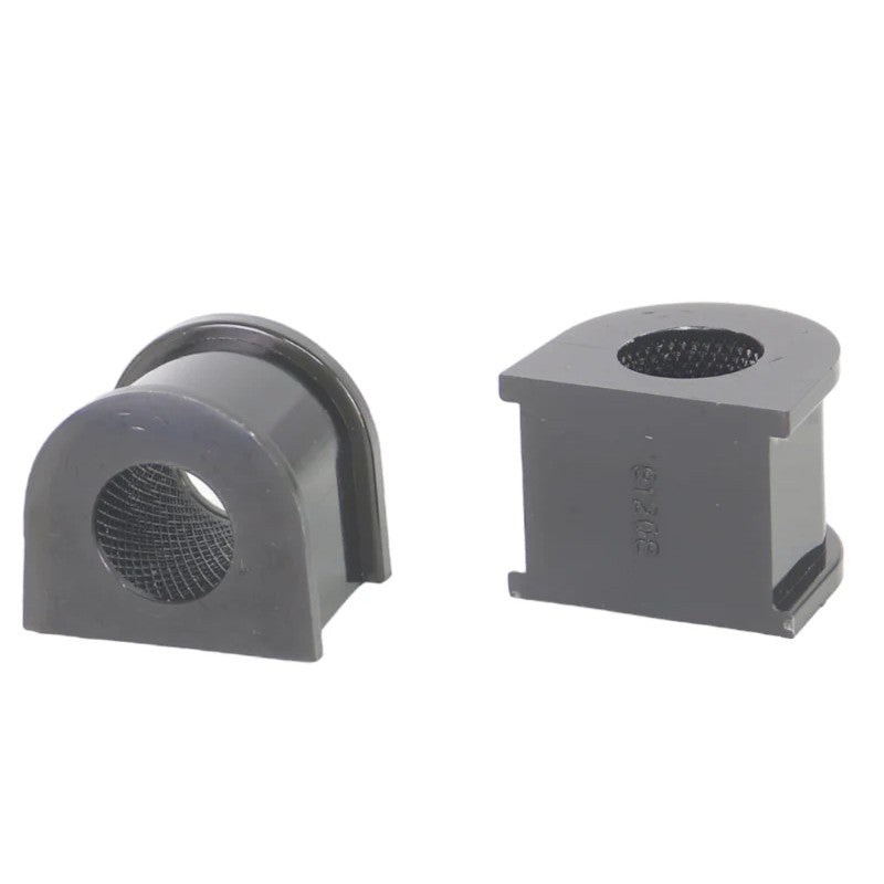 Two yellow 21mm Whiteline elastomer sway bar mount bushings with knurled internal bores and grease packets.