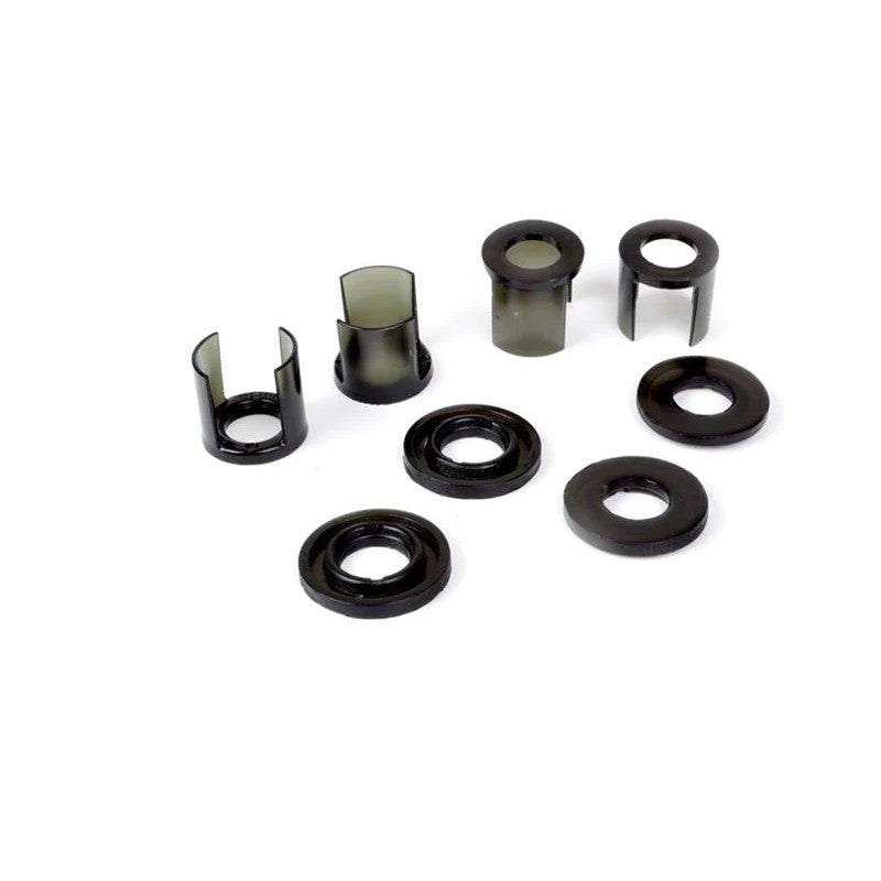 Yellow synthetic elastomer rear subframe mount insert bushings with molybdenum disulphide grease packet.