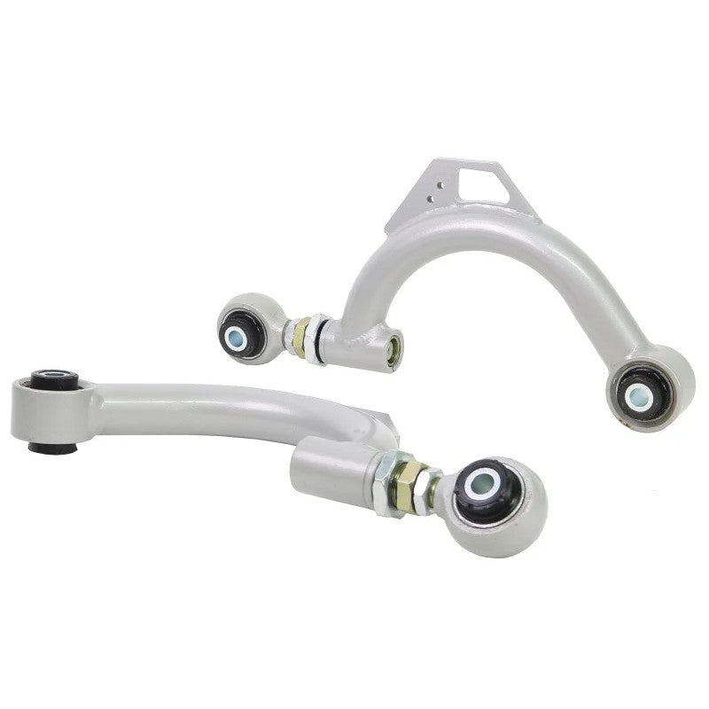 Pair of Whiteline KTA259 adjustable rear upper control arms with black powder coating and silver hardware.