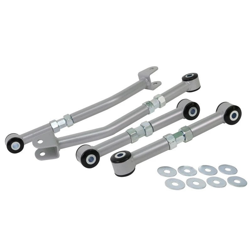 Whiteline KTA124 adjustable rear lower control arm kit with four arms, black bushings, and gold-finish adjustment hardware.