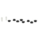 Whiteline Plus front control arm lower inner bushing kit featuring synthetic elastomer bushings and metal sleeves.