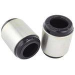 Whiteline W62999 synthetic elastomer rear lower trailing arm bushings with internal grease reservoirs and grease packet.