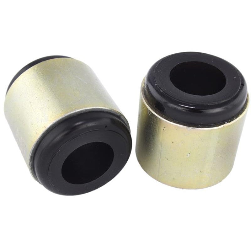 Whiteline Plus synthetic elastomer rear trailing arm bushing with yellow finish and inner metal sleeve.