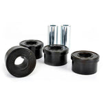 Whiteline Plus W63401 synthetic elastomer rear lower inner control arm bushings with metal sleeves and mounting grease.
