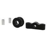Whiteline Plus W92610 front transmission shifter stabilizer bushing with internal grease reservoirs and protective plating.