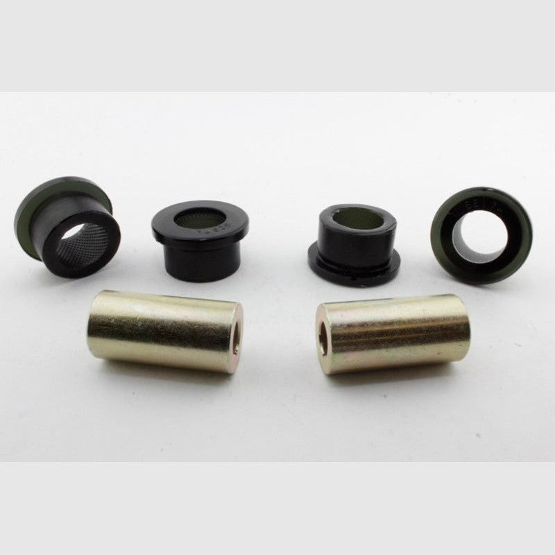 Whiteline Plus W63155 synthetic elastomer rear lower outer control arm bushings with metal sleeves and LM grease.
