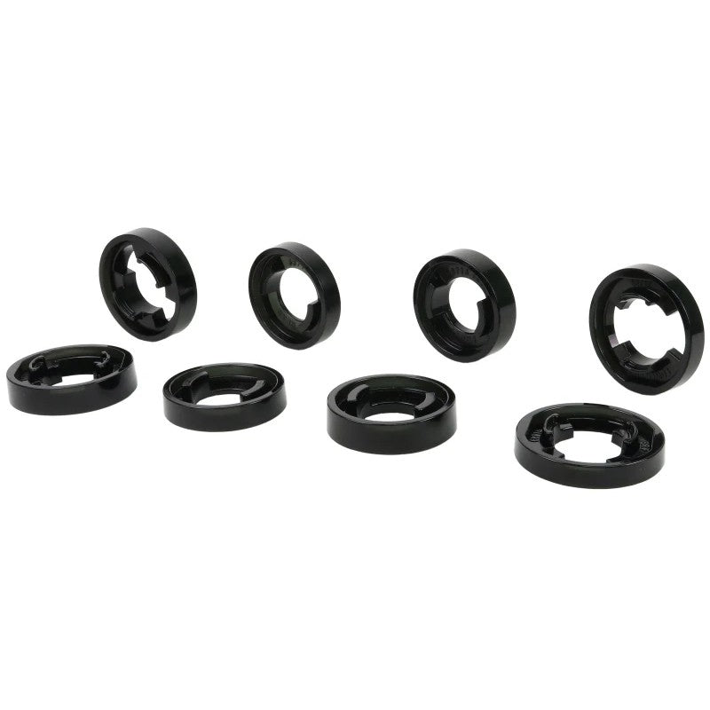 Whiteline Plus black synthetic elastomer crossmember mount inserts and molybdenum disulphide grease packet.