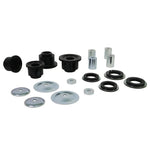 Four yellow Whiteline Plus synthetic elastomer rear subframe mount inserts with included molybdenum grease packet.