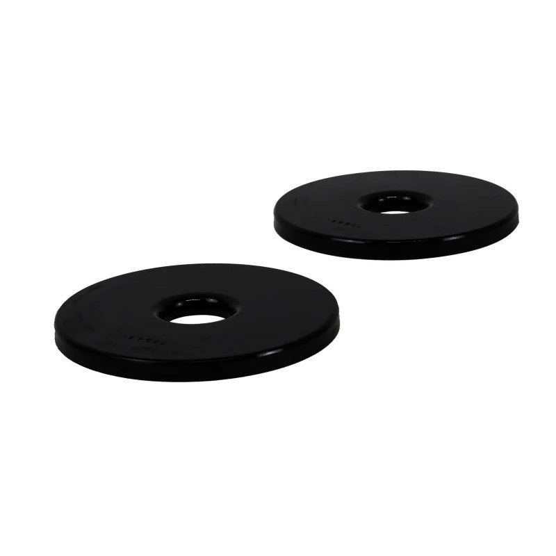 Whiteline Plus W72044 synthetic elastomer 10mm rear spring pad lower bushing providing a 14mm height increase.