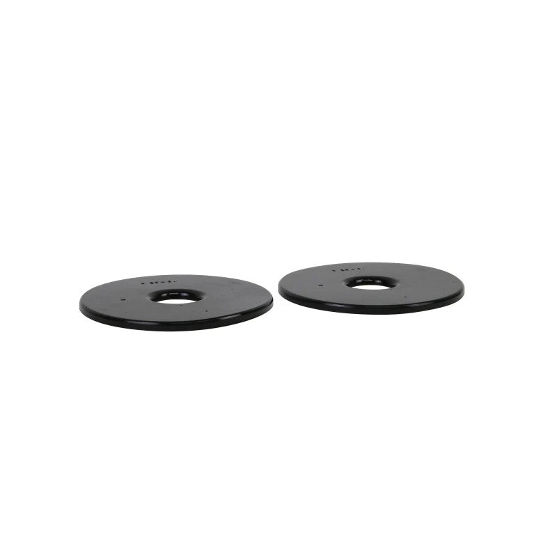 Whiteline Plus synthetic elastomer rear spring pad lower bushing for ride height adjustment.
