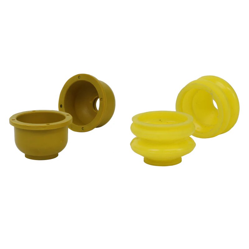 Four black rubber Whiteline W0903 replacement dust boots for KCA395 ball joints