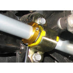 Two-piece silver aluminum Whiteline 33mm sway bar lateral locks with mounting hardware