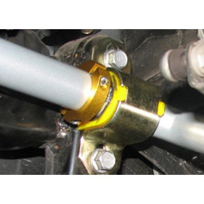 Two-piece silver aluminum Whiteline 33mm sway bar lateral locks with mounting hardware