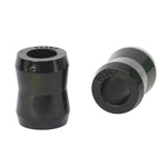 Pair of Whiteline black synthetic elastomer universal shock eye bushings with a packet of assembly grease