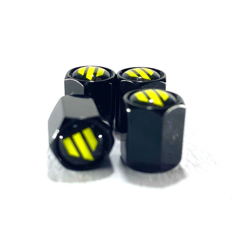 Set of four Whiteline tire valve stem caps precision-machined from anodized alloy.
