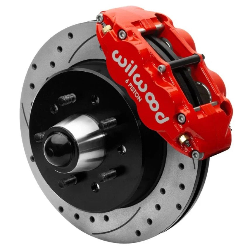 Wilwood red 6-piston Superlite calipers and 12.19-inch drilled and slotted brake rotors for 1963-1987 Chevy C10.