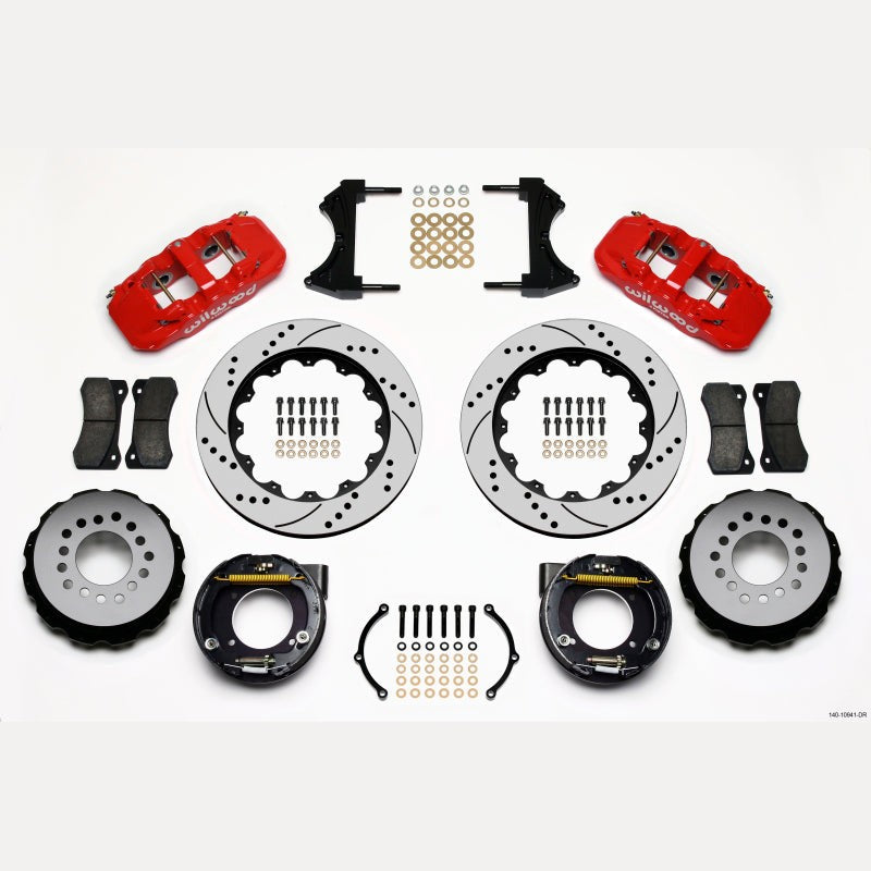 Wilwood AERO4 rear brake kit with red 4-piston calipers and 14-inch drilled rotors for 5-lug Chevy and GMC trucks.