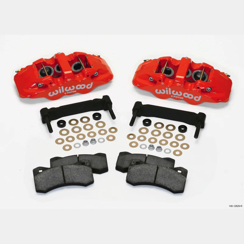 Red Wilwood AERO6 six-piston front brake calipers and mounting brackets for 1997-2013 Chevrolet Corvette.