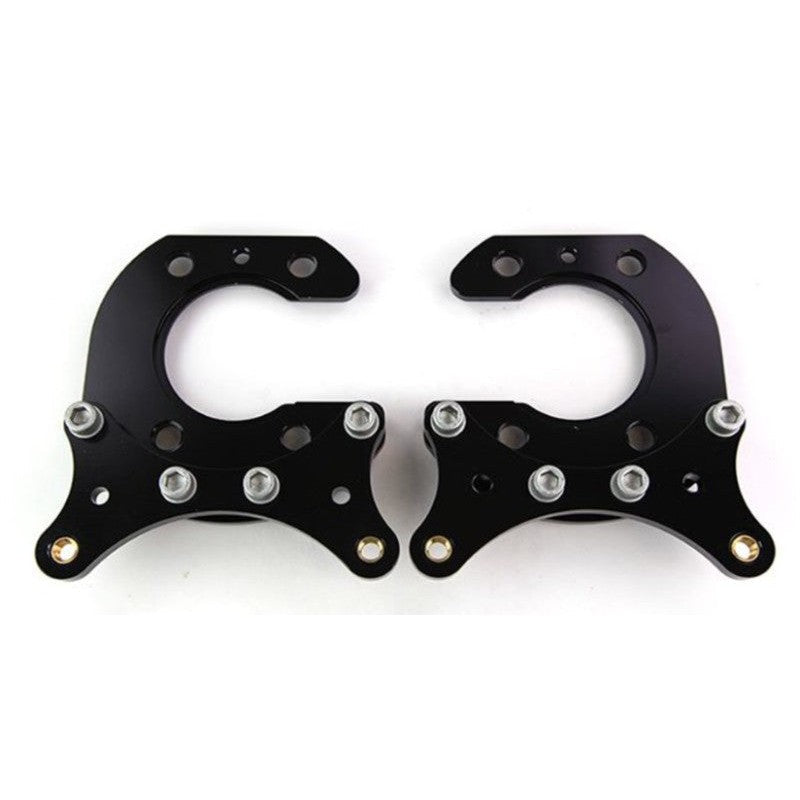 A pair of Wilwood aluminum rear brake caliper brackets with steel clinch nuts for Big Ford 2.50-inch offset axles.