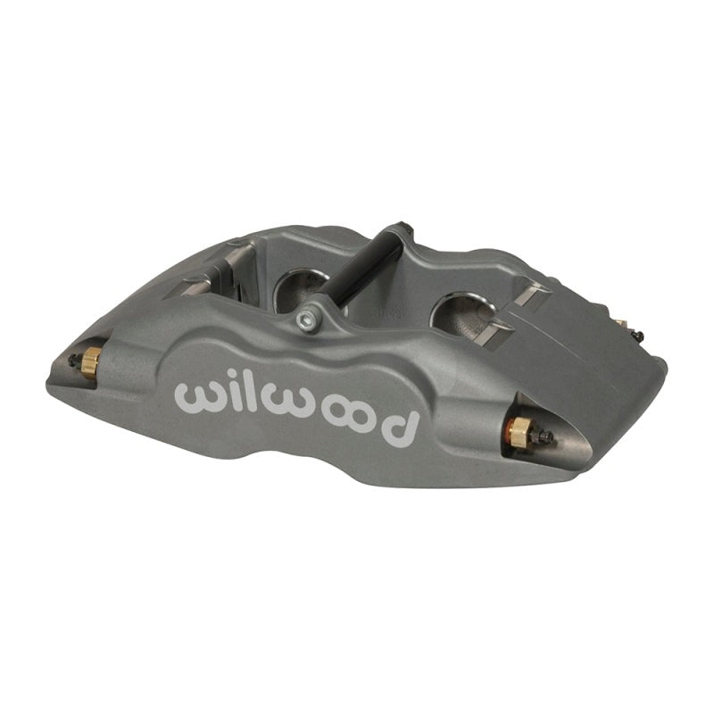 Wilwood Forged Superlite FSLI forged aluminum 4-piston brake caliper showing piston bores and internal fluid ports.
