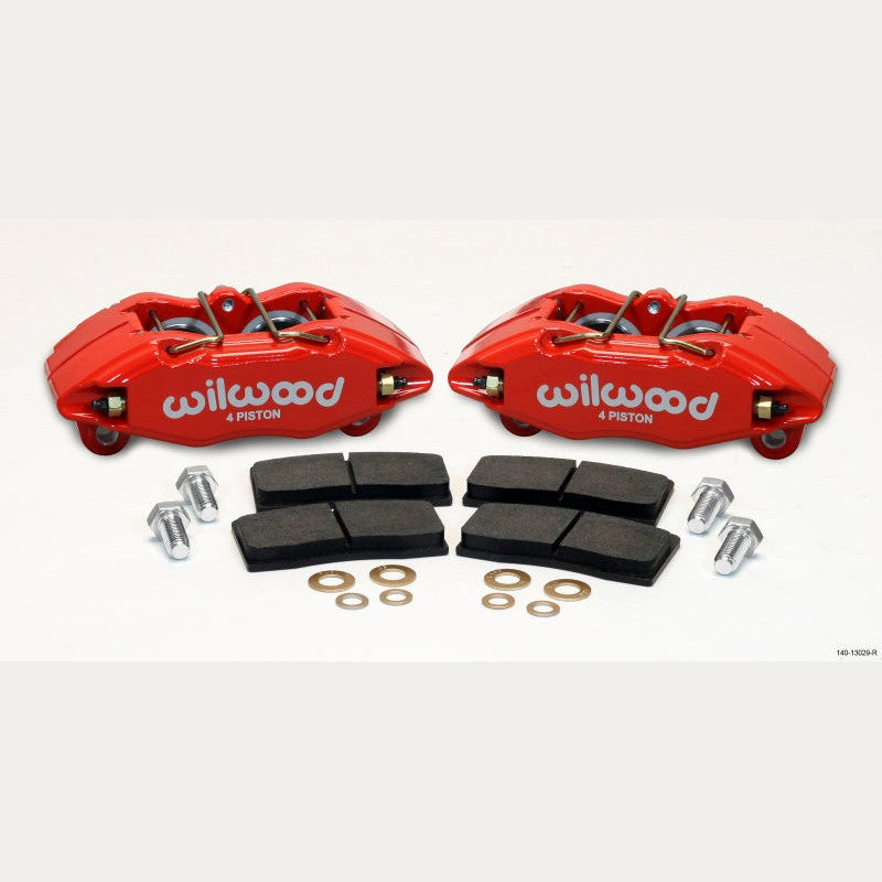 Red Wilwood DynaPro DPHA 4-piston front brake calipers and high-performance brake pads for 262mm rotor applications.