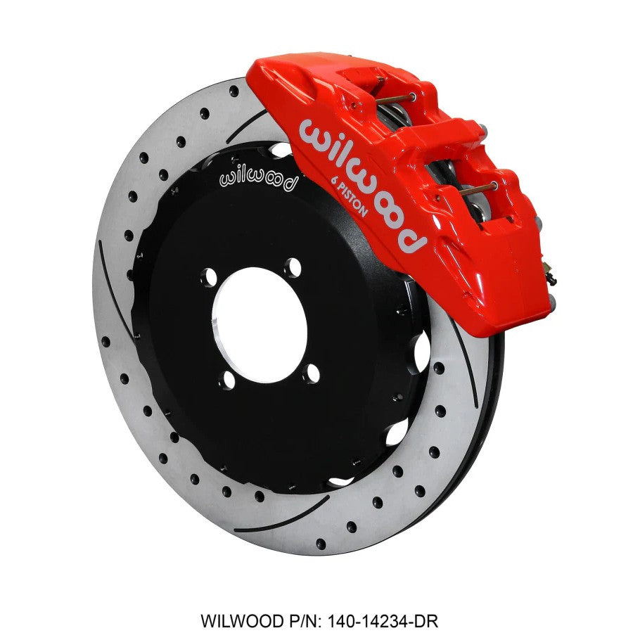 Red Wilwood DynaPro 6-piston front calipers with drilled 12.88-inch rotors and stainless steel braided brake lines.