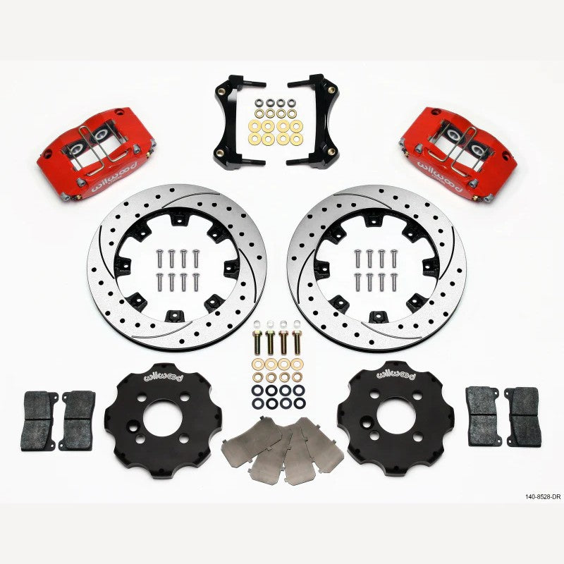 Wilwood Dynapro radial front brake kit featuring red 4-piston calipers and 12.19-inch cross-drilled rotors.