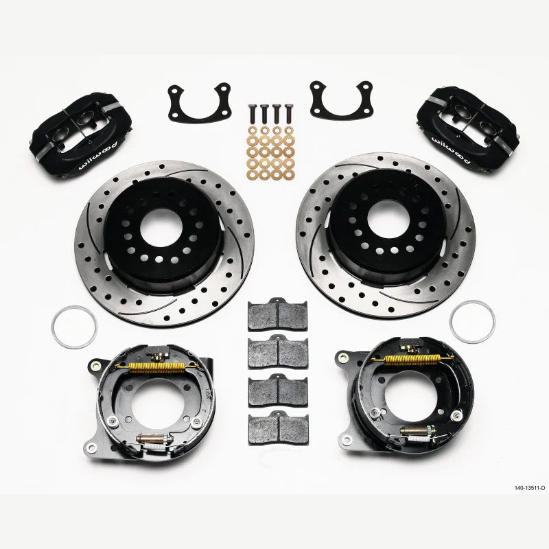 Wilwood rear disc brake kit featuring black 4-piston calipers, drilled rotors, and internal shoe parking brake assembly.