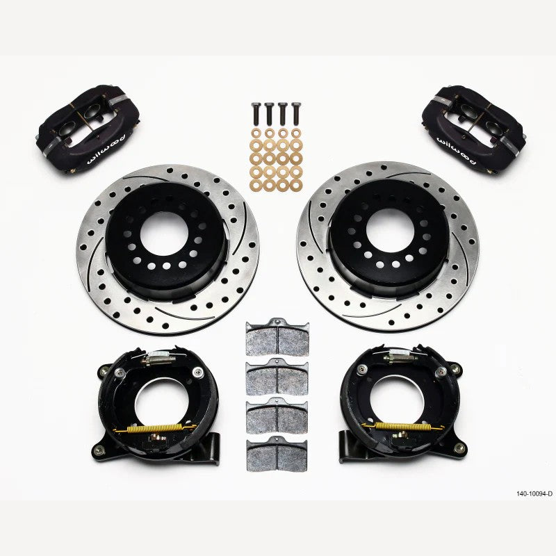 Wilwood Forged Dynalite 4-piston rear calipers and 12.19-inch drilled rotors with internal parking brake assembly.