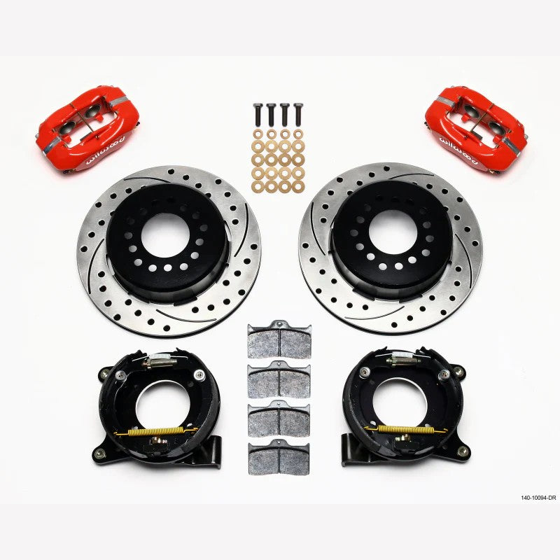 Wilwood red 4-piston Forged Dynalite calipers with 12.19-inch drilled and slotted rotors for 5-lug Chevy C10 axles.
