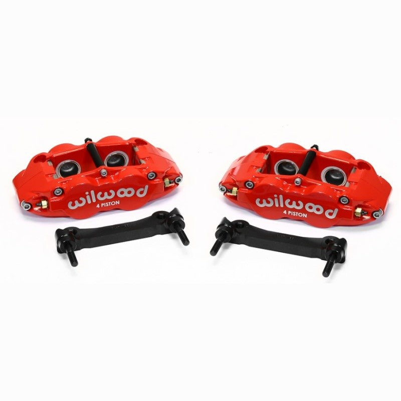 Red Wilwood Narrow Superlite 4R four-piston rear calipers with black mounting brackets and brake pads.