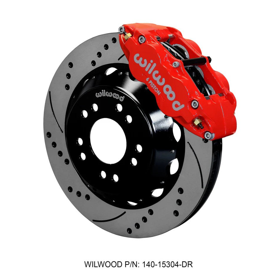 Wilwood Narrow Superlite 6R front brake kit featuring red 6-piston calipers and 14-inch drilled and slotted rotors