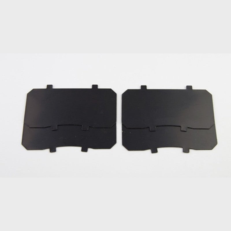 Four Wilwood steel and elastomeric brake pad shims for DL, NDL, and Dynapro Radial calipers