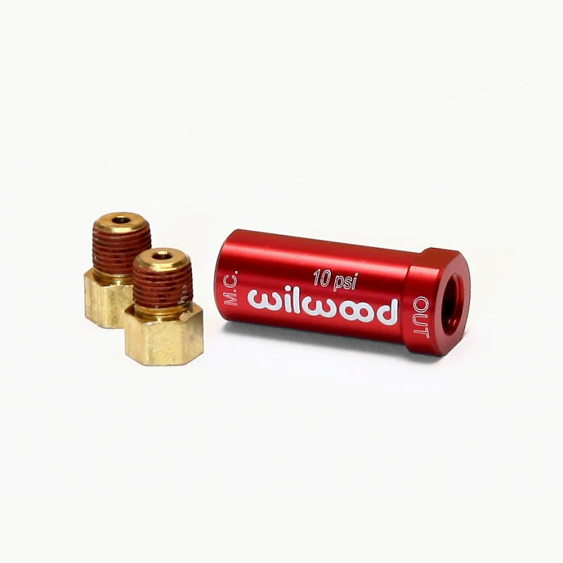 Red anodized billet aluminum Wilwood 10 pound residual pressure valve with two brass NPT to inverted flare fittings.