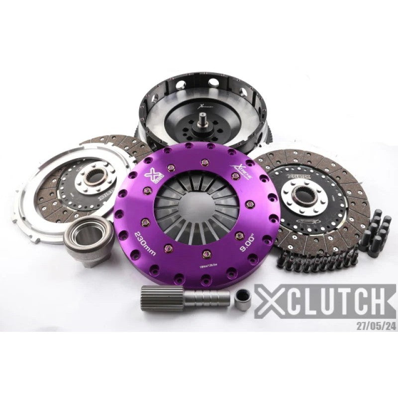 XClutch twin-disc solid organic clutch kit with lightweight alloy hat, 8-bolt flywheel, and installation hardware.