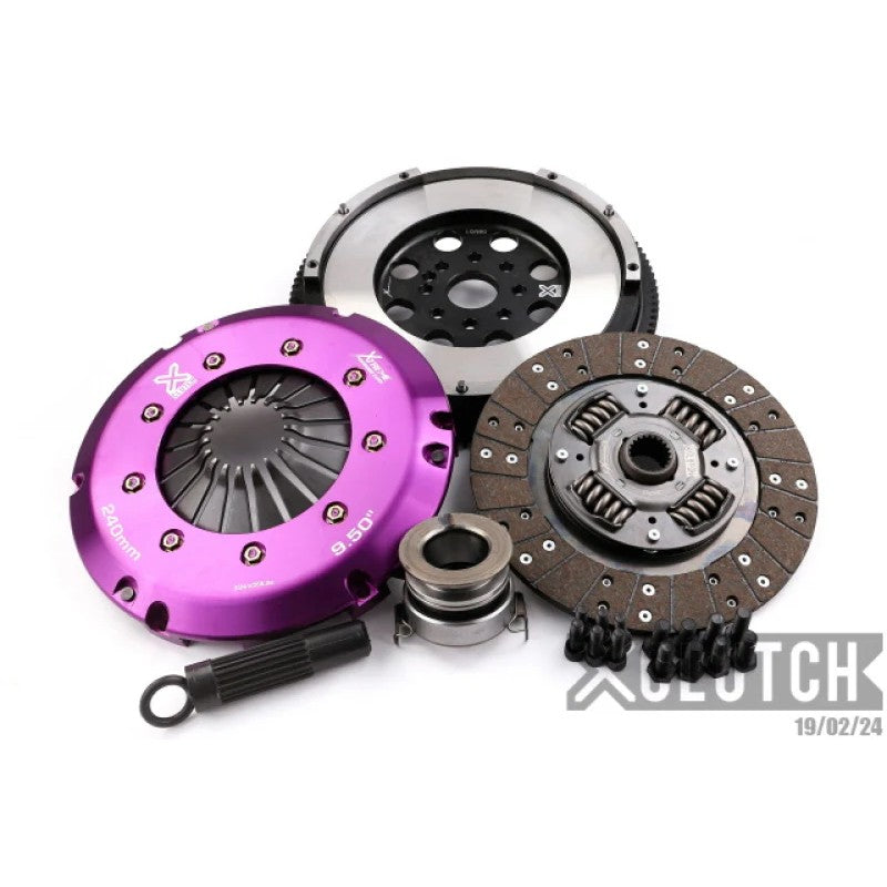 XClutch Stage 1 sprung organic clutch kit featuring a heavy-duty pressure plate, friction disc, and alignment tool.