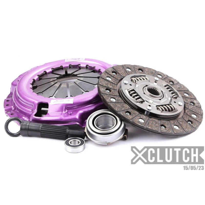 XClutch Stage 1 sprung organic clutch kit including pressure plate, friction disc, bearings, and alignment tool.