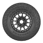 Yokohama Geolandar M/T G003 mud-terrain tire featuring aggressive tread blocks and rugged sidewall lugs