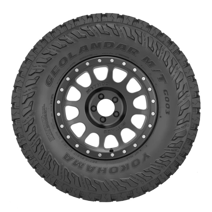 Yokohama Geolandar M/T G003 mud-terrain tire showing aggressive tread blocks and sidewall armor