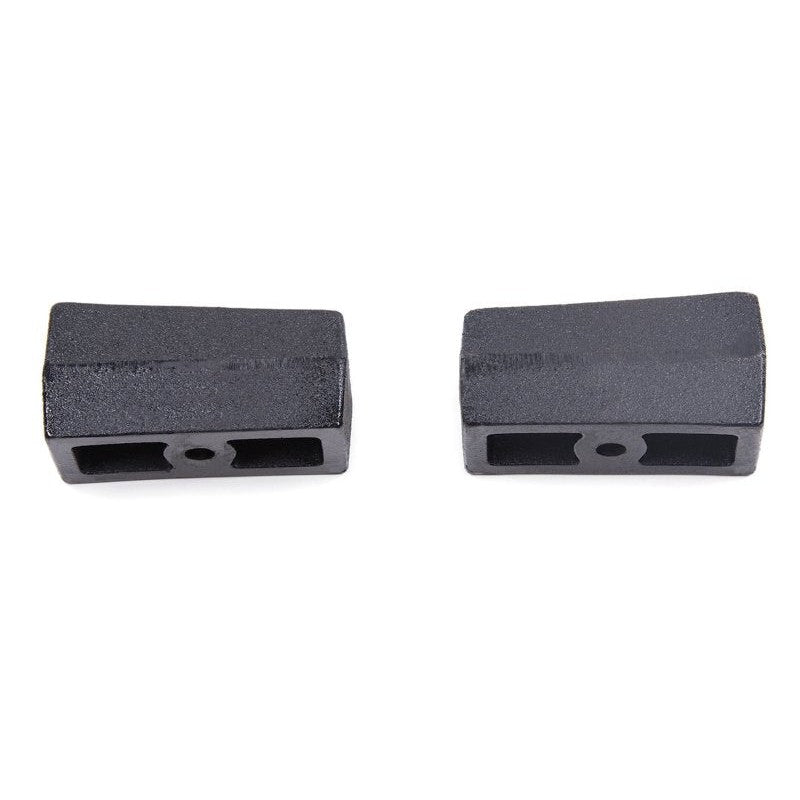 Zone Offroad black e-coated 3-inch tapered cast iron lift blocks with 9/16-inch pins for leaf spring trucks.