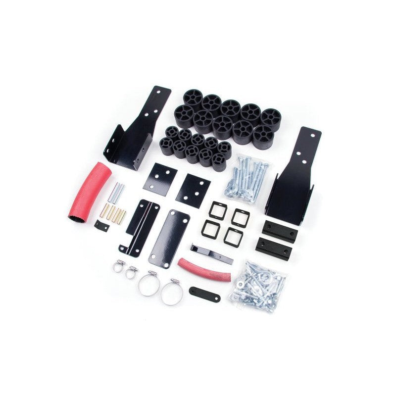 Zone Offroad 2-inch body lift kit components for 1998-2004 GM S-Series trucks including mounting blocks and hardware.