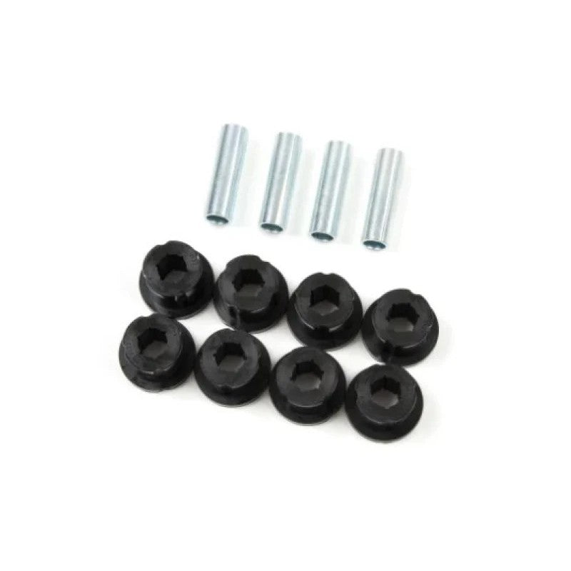 Zone Offroad ZONJ7001 control arm bushing kit featuring eight black urethane halves and four steel sleeves.